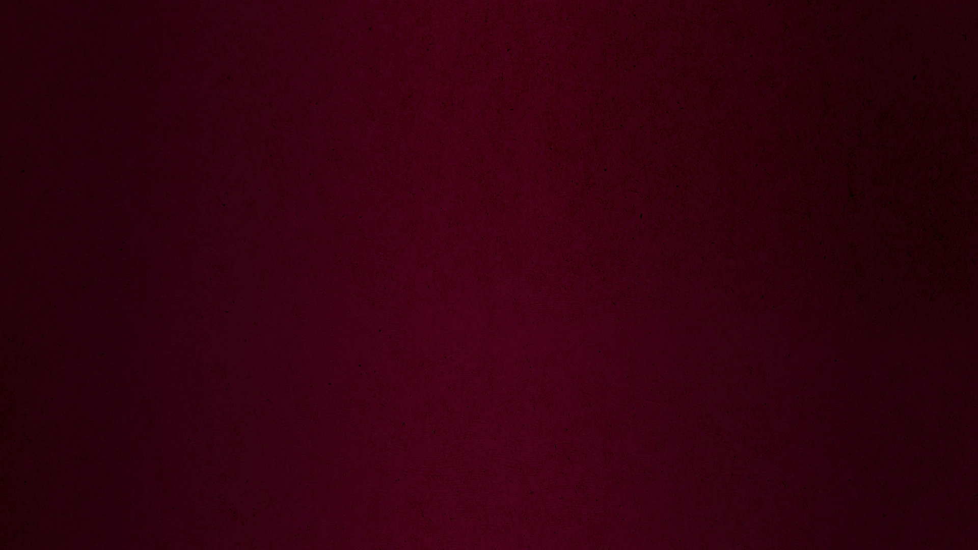 Solid dark red textured background with a subtle gradient from deep red to maroon.