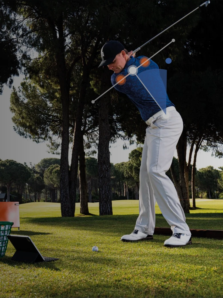 Golfer in mid-swing on a course, with a digital overlay showing movement analysis, surrounded by trees and grassy terrain.